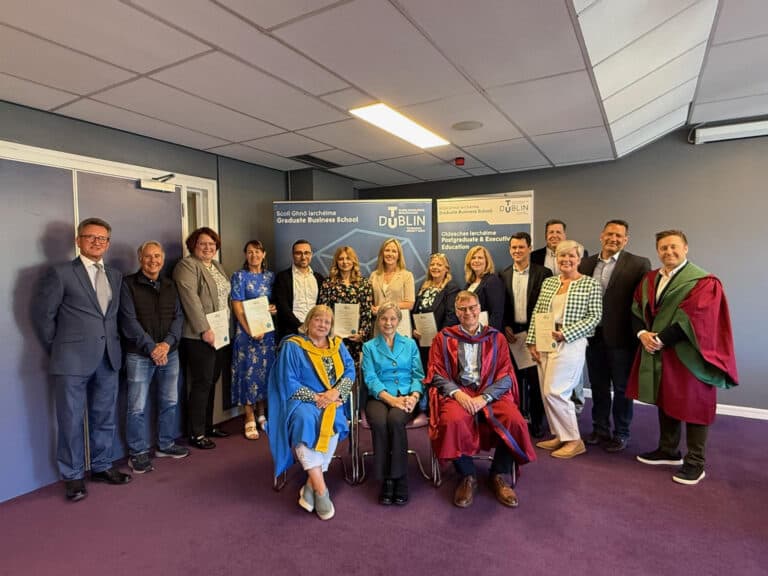 Certification 8 Group photo of QBL graduates with certificates.