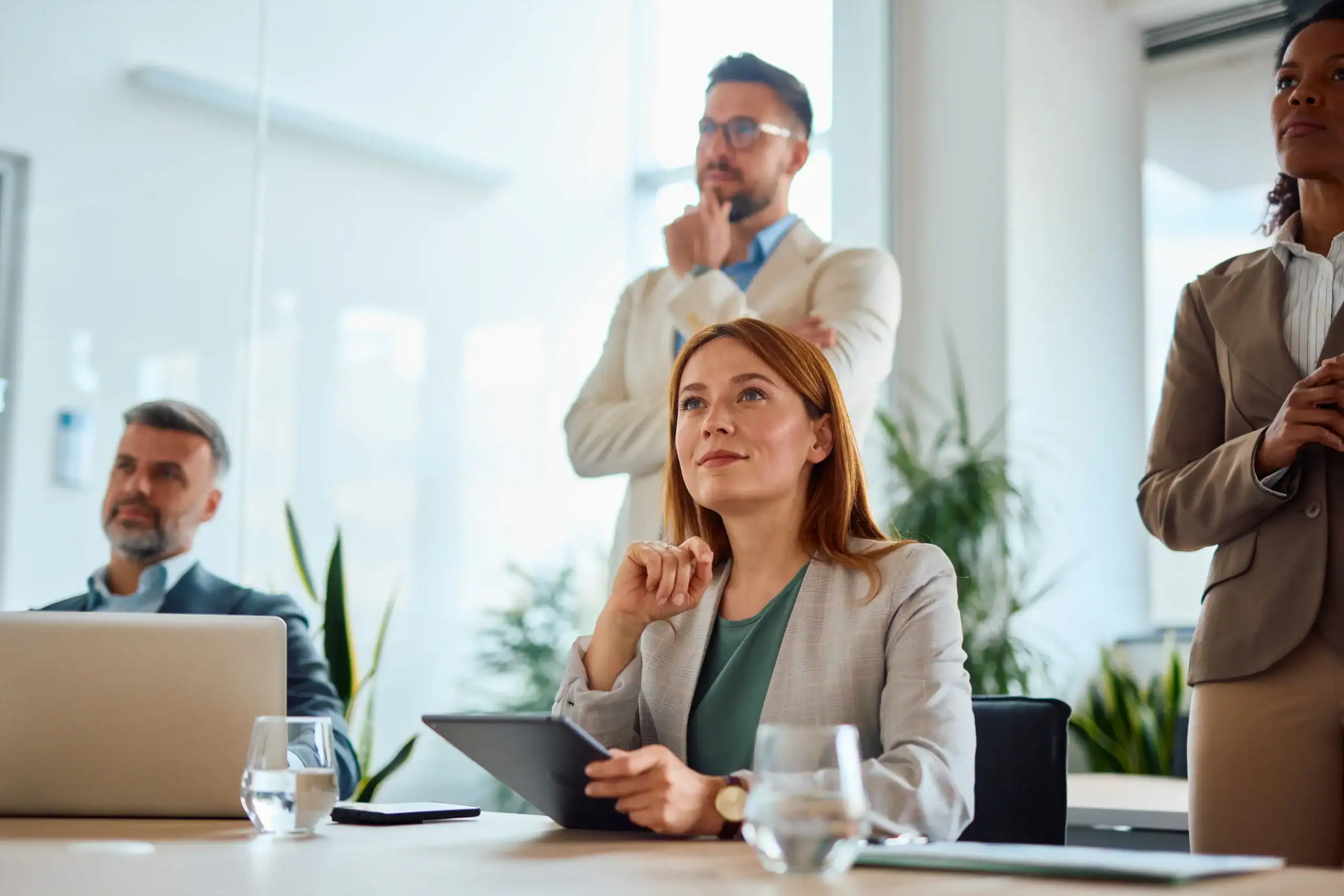 Home 1 business people in a meeting scaled